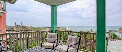 Oceanfront deck with comfy seating