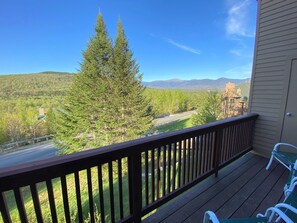 Enjoy the main level walkout deck with Mount Washington views