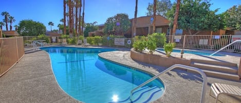 Our Covered Patio is behind the 3 palm trees, on the right side of this picture.