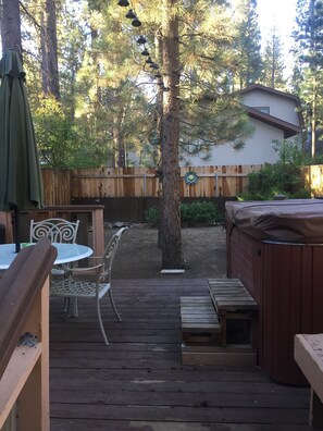 View of back yard from back kitchen door. Fully fenced yard for kids to play