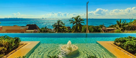 Infinity Pool overlooking Cancun Skyline