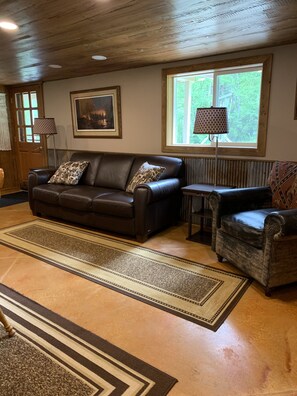 Open floor plan with family room next to dining room and kitchen 