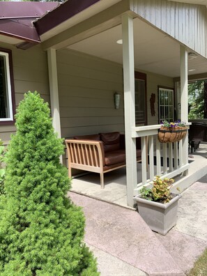 Flowers and seating area at entrance