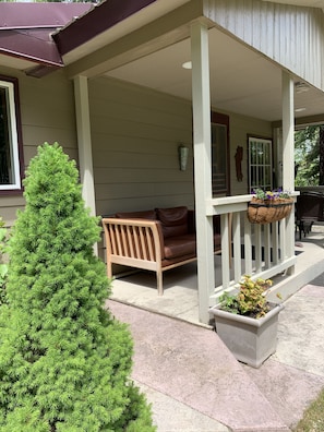 Flowers and seating area at entrance