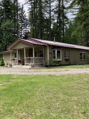 Covered front porch and large yard