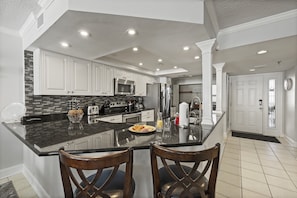 Completely redesigned open concept kitchen provides plenty of counter space