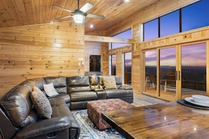 Kick back on the comfortable sectional as you view the Kiamichi Mountains!