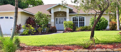 Beautiful home with lovely landscaping in a quiet neighborhood