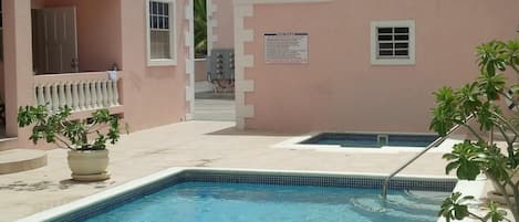 Pool and hot-tub. Leading off of patio. 