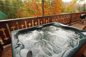 4 person Hot Tub with private wooded views.