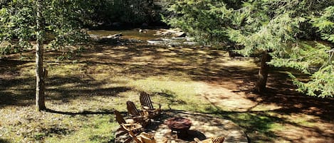 View of river and firepit from main deck.