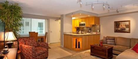 Living room & dining room with full kitchen.