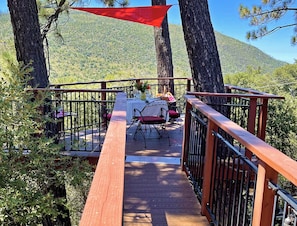 TREE HOUSE DECK IS VERY HIGH UP. Three Coulter Pines support deck with Lake View