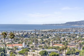 View of Mission/Pacific beaches along with fishing boats leaving the harbor.