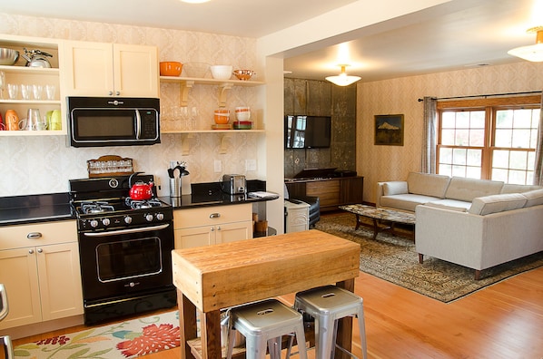 Full kitchen & adjacent living space