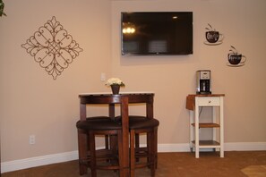 Dining Area with large High Definition LED Smart TV.