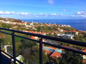 Caniço can be fully enjoyed with this balcony view.