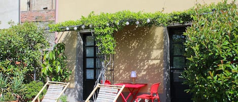 Garden with deckchairs for relaxing