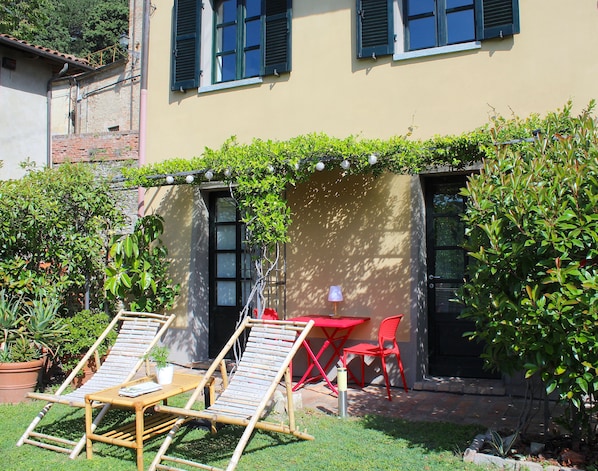 Garden with deckchairs for relaxing