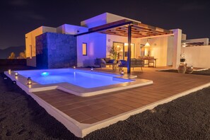 Beautiful terrace with outdoor furniture and private swimming pool heated by heat pump.