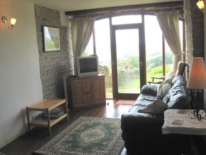 The lounge - with stunning views across farmland towards the Flyde Coast