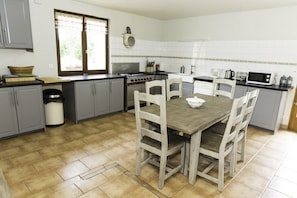 fully equipped kitchen with SMEG range cooker