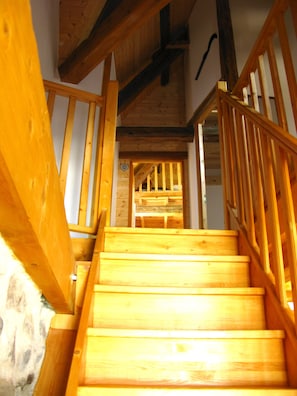 the stairs with view into bed 1 straight ahead and bed 2 to the right
