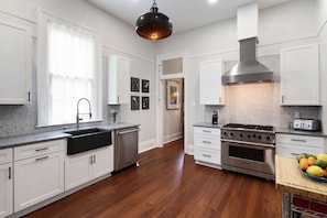Newly renovated kitchen with Viking appliances & original antique pine flooring.