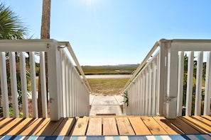 Deck steps to marsh side of villa