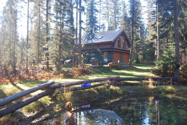 pond and carriage house