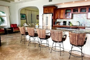 Three Palms Expansive Kitchen and Great Room is set up for entertaining.