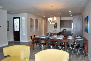 Main floor gathering room has space to relax, cook & enjoy your favorite food!