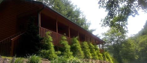 side view of cabin as you drive in from private road