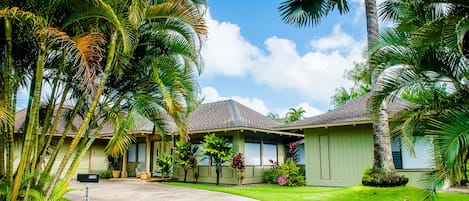 Beautiful Hawaiian Style Home surrounded by tropical gardens!