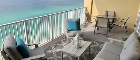 Grab a book, something to drink and relax on our balcony overlooking the ocean!
