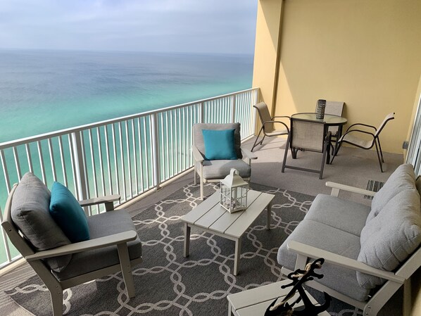 Grab a book, something to drink and relax on our balcony overlooking the ocean!