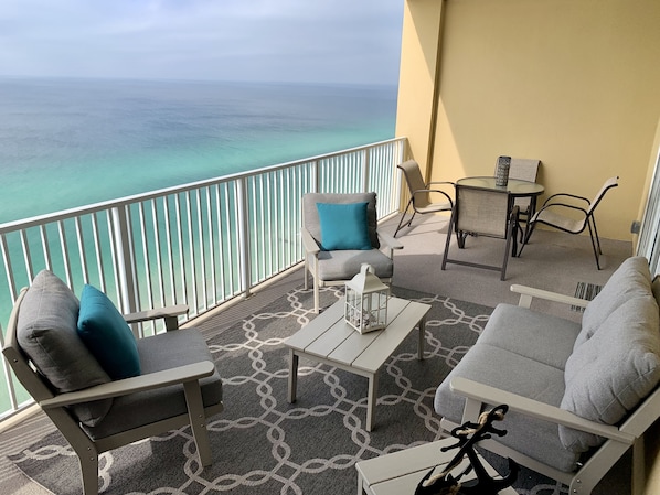 Grab a book, something to drink and relax on our balcony overlooking the ocean!