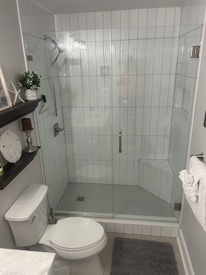 Master-New walk in shower, counter height cabinets and high toilet!