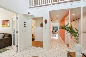 View from entryway-Aloha & Rainbow Rms left, Ocean Rm right, dining rm down hall
