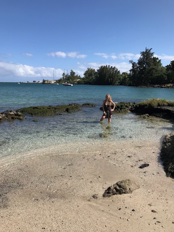 Hilo has some beautiful, safe, light sandy beaches great for swimming