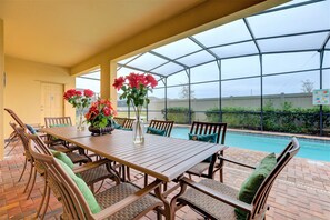 Fully Screened Backyard Outdoor Living Area