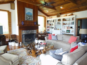 Living room with wood burning fireplace