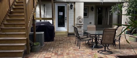 Outdoor view: Back door ground level, left side entry to shared laundry room!