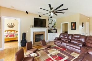 The family room sofa also has two recliners to sit back, relax & watch the river