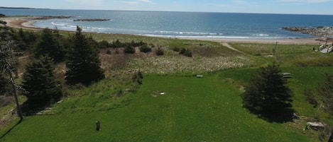 This is the house and thats the beach 100ft away. no house in the area is closer