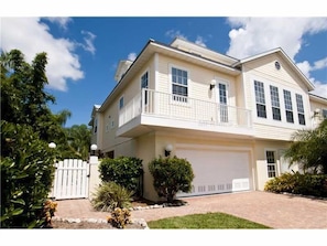 Front of and side entrance to 'A Pearl of a Beach Home.....
