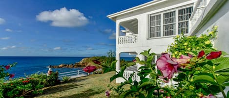 Eastern view of the house with garden bloom and ocean view