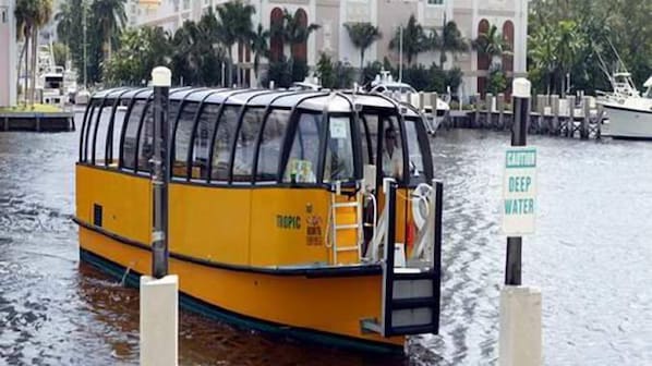 Water taxi accessible from the back of the hotel.