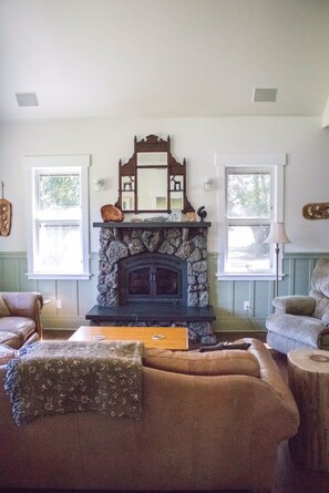 Basalt stone fireplace.  Come in from cold winter and get warm and cozy.