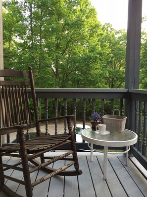 Morning coffee on the front porch.  Enjoy the singing of early birds.